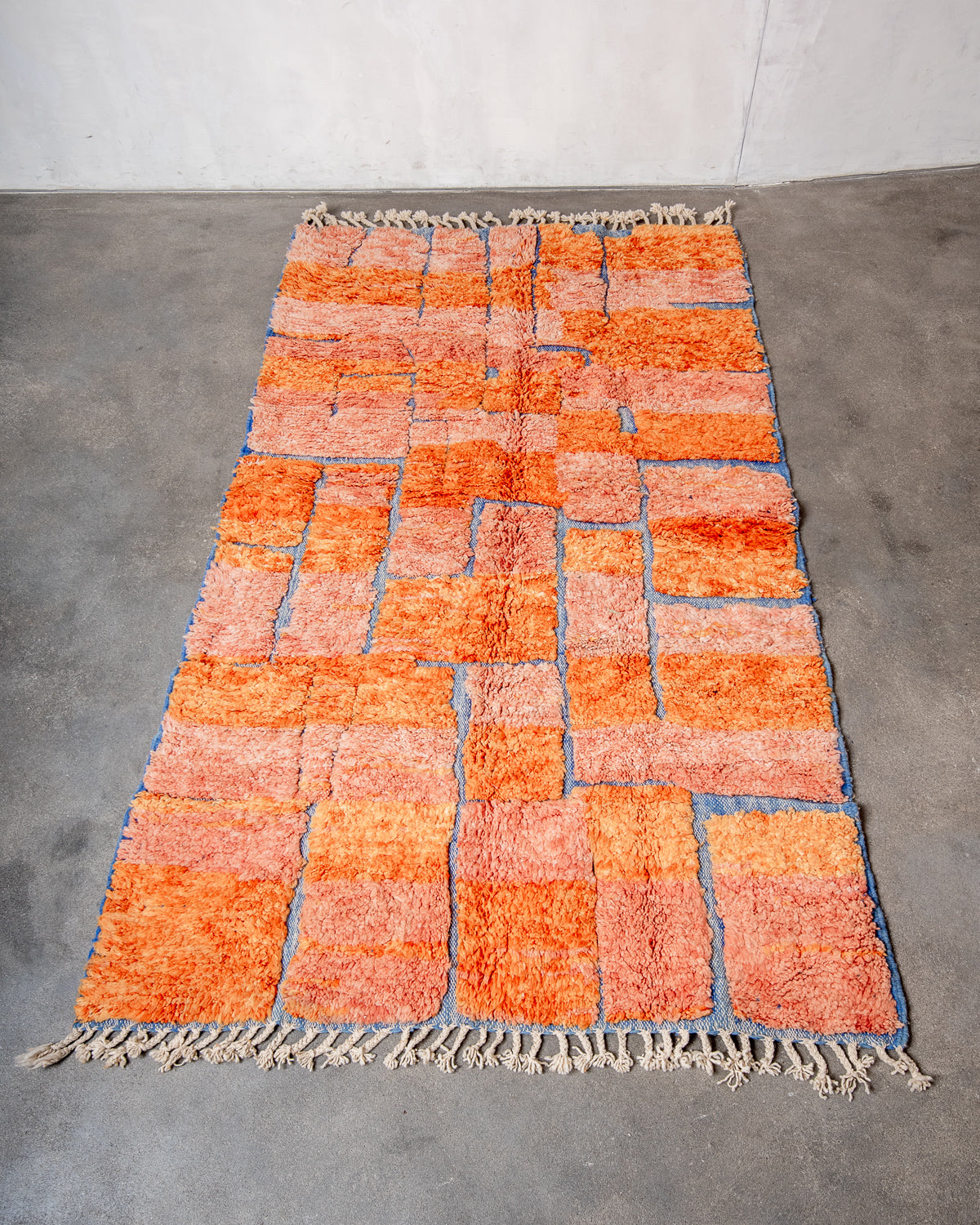 Modern, designer, handcrafted Berber rug from Morocco. Beniourain carpet with beautiful colours and patterns and fluffy wool texture.